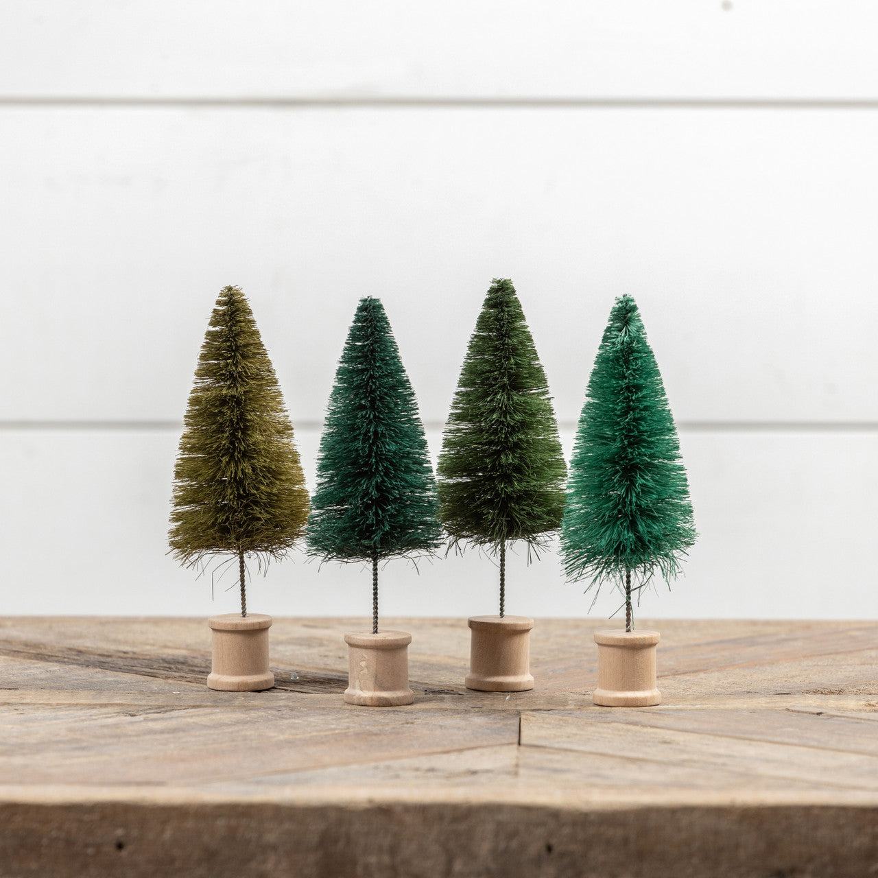 Set of 4 Green Bottlebrush Trees w/Spool Base